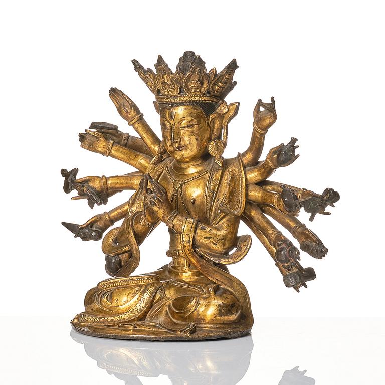 A gilt-bronze figure of a Boddhisattva, Ming dynasty (1638-1644).