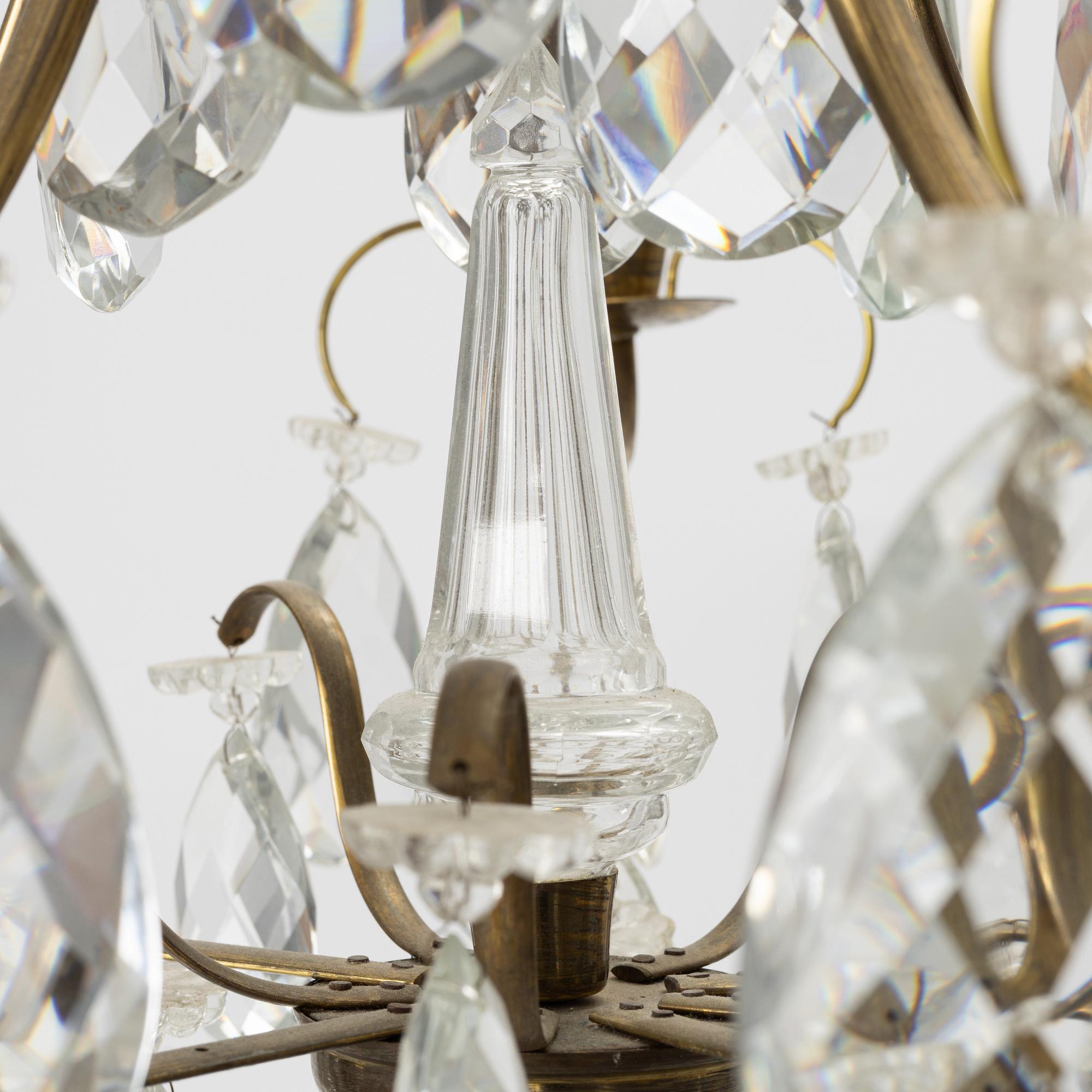 Takkrona, barockstil, 1900-talets första hälft.