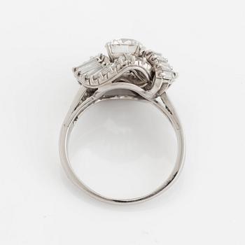 A Boucheron platinum ring set with a round brilliant-cut diamond weight ca 1.25 cts quality ca H vvs.