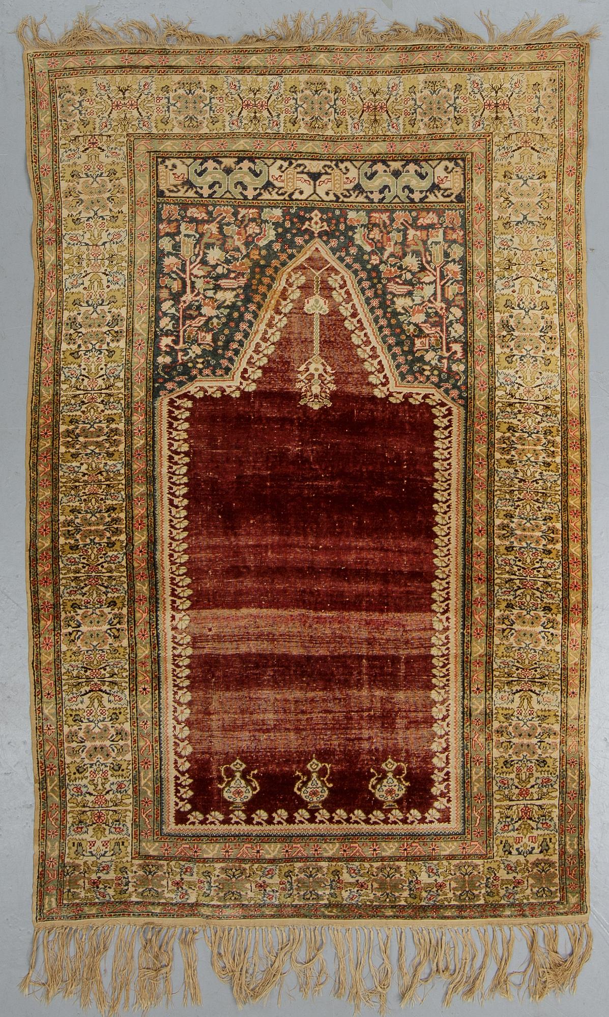 A rug, an antique Anatolia, probably Gördes (Ghiordes), a prayer rug, ca ca 188 x 124 cm.