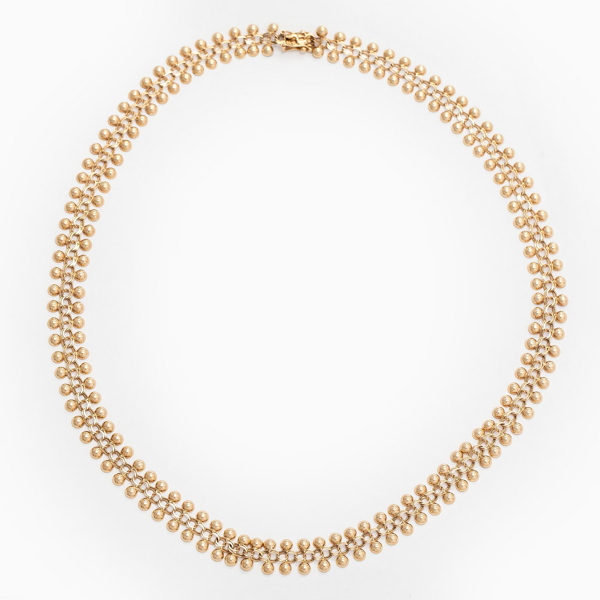 A 14K gold necklace.