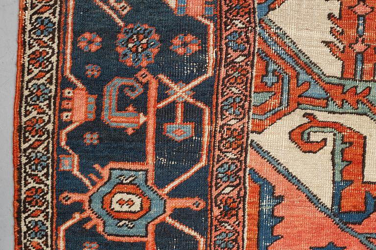 A carpet, an antique Heriz, ca 469,5-471 x 300-309,5 cm.