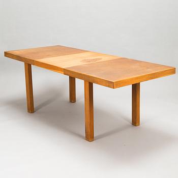 Carl Gustaf Hiort af Ornäs, Extending dinner table, "Näyttely Junior", Huonekalu M. Nupponen Oy. Design year 1955.