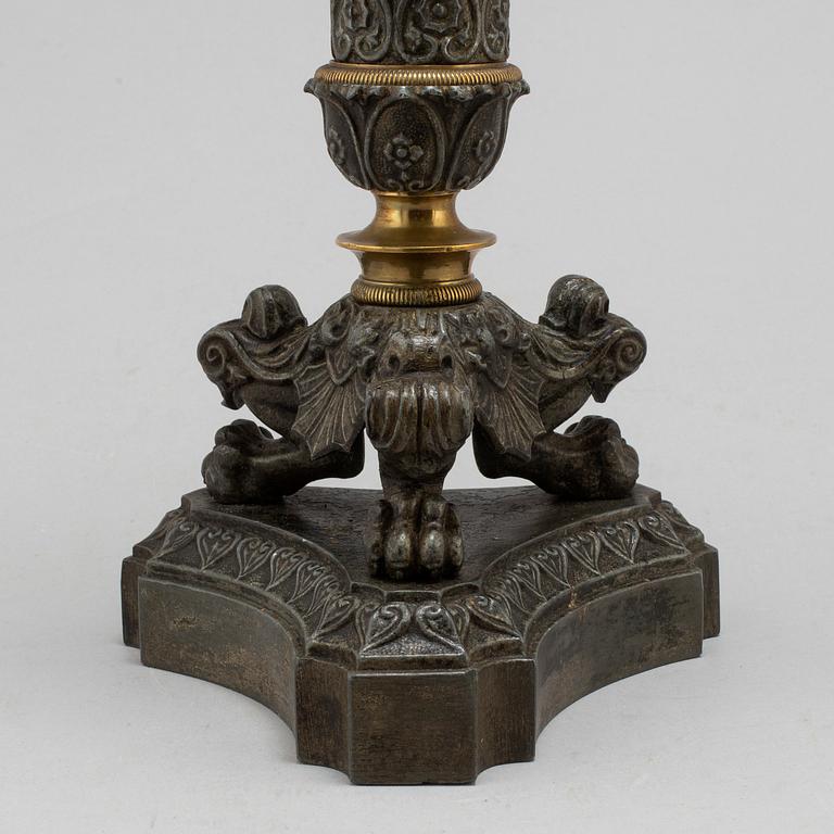 A mid 19th century late empire candlestick.