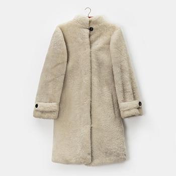Yves Saint Laurent, kappa, storlek ca M.