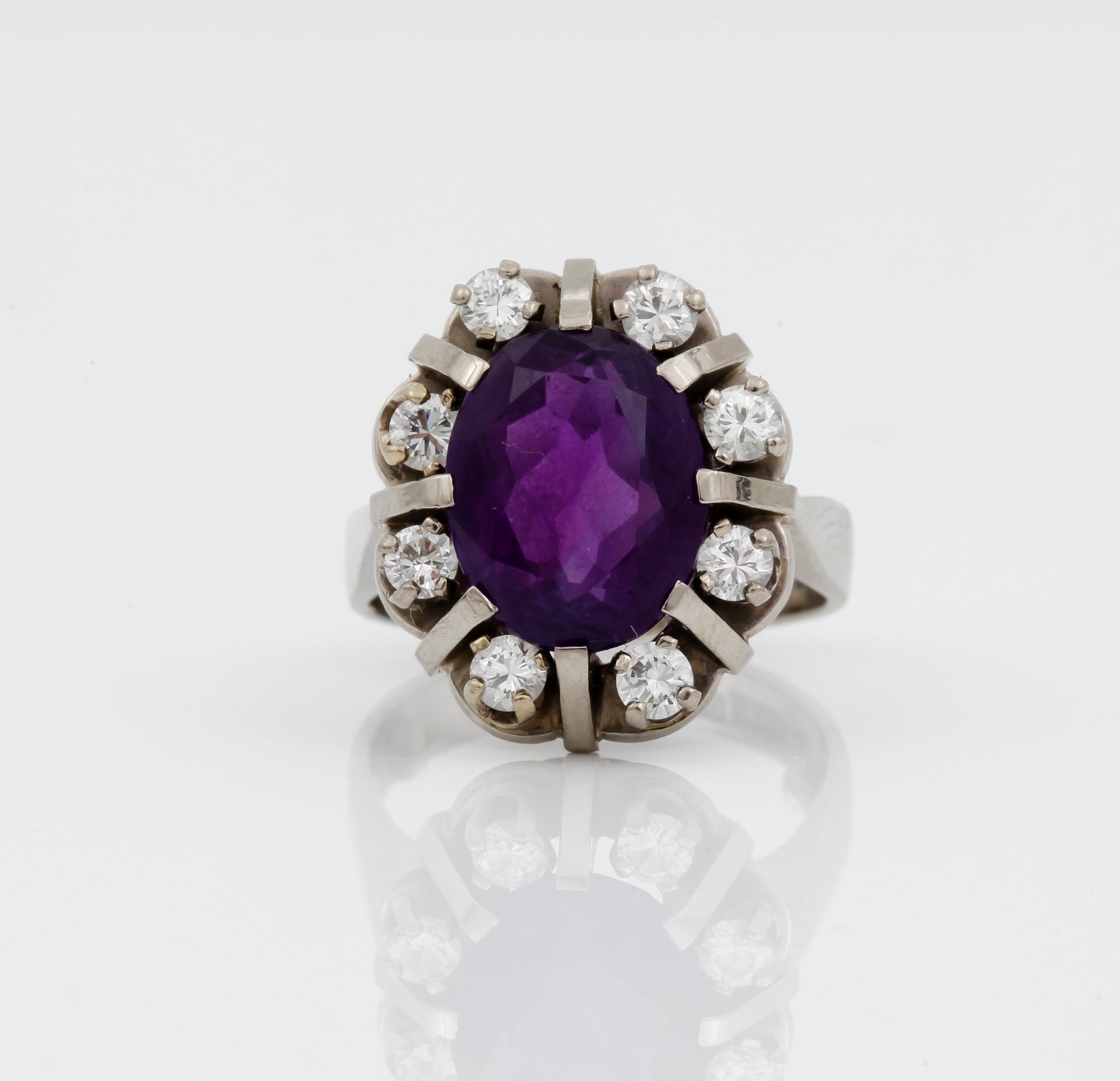 RING, vitguld 18k, ametist, diamanter, 0,72 ct enligt gravyr, Sverige 1964. Vikt ca 11 gram.