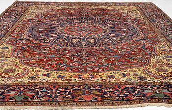 A semi-antique Ahar carpet, c 335 x 275 cm.