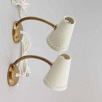 A pair of wall lights from Elidus, Fristad.