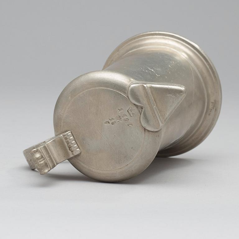 A pewter jug by J Ch Pohlitz 1727.