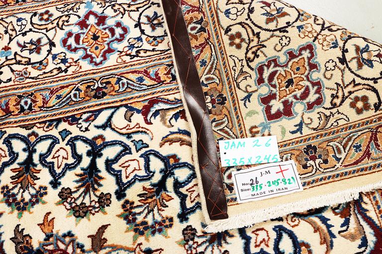 A Nain carpet, 9 laa, part silk, Iran, c. 335 x 245 cm.