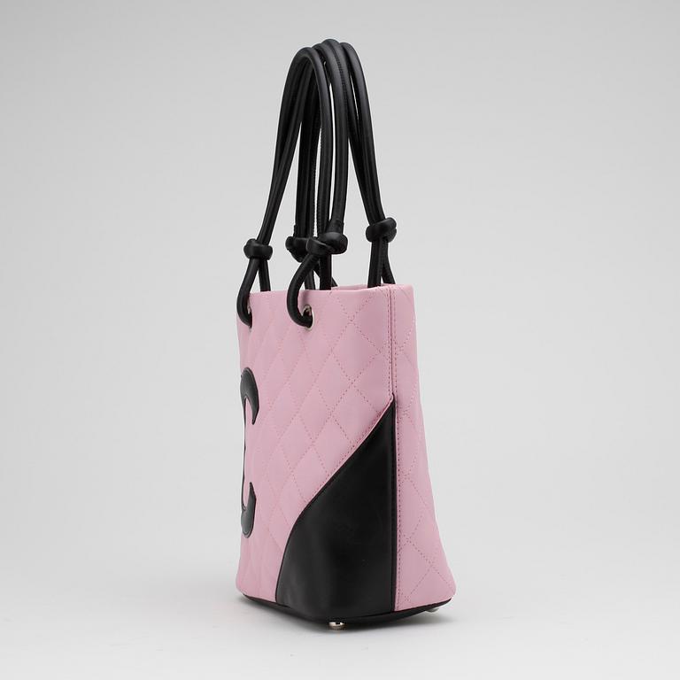 CHANEL, a pink leather "Small Shopping" handbag.