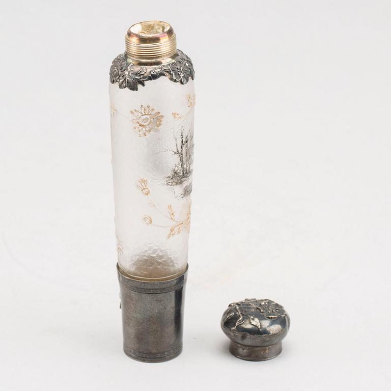 A Daum Nancy perfume bottle.