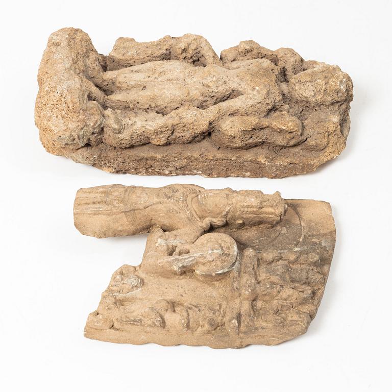 Two Indian stone fragments, 19th century or older.