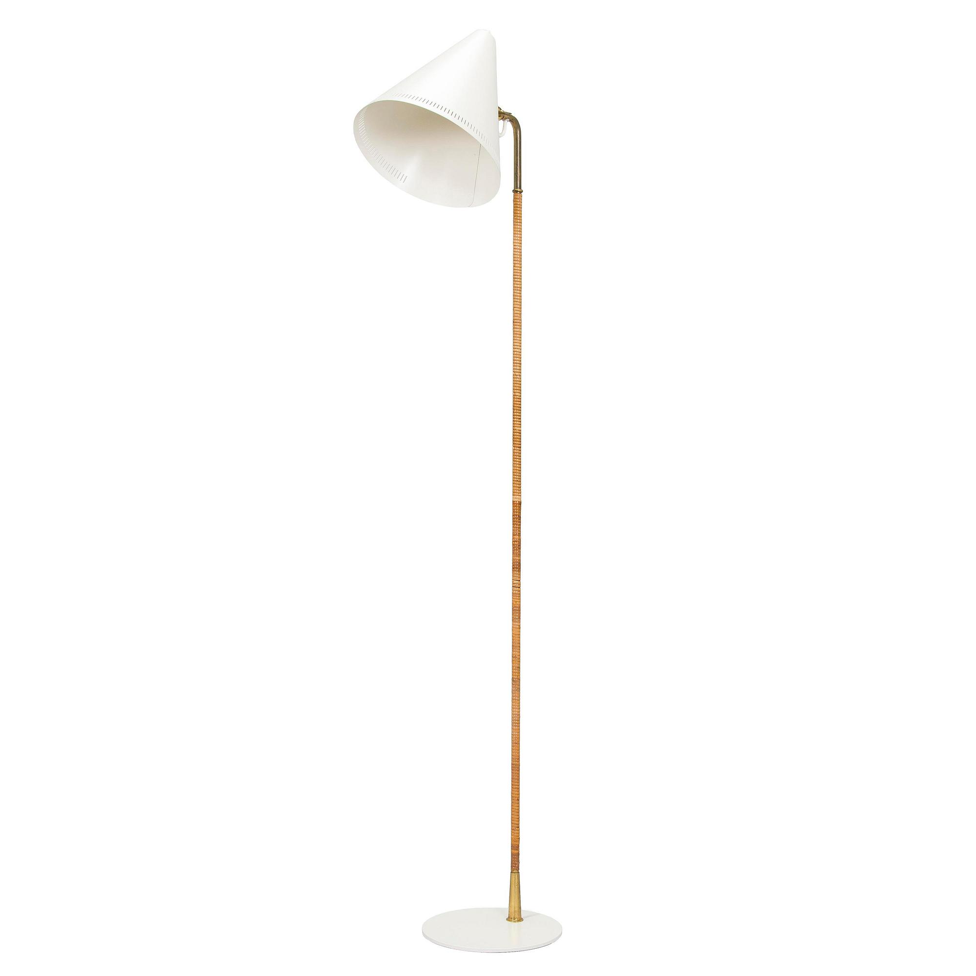 Paavo Tynell, a mid-20th century K10-10 floor lamp for Taito.