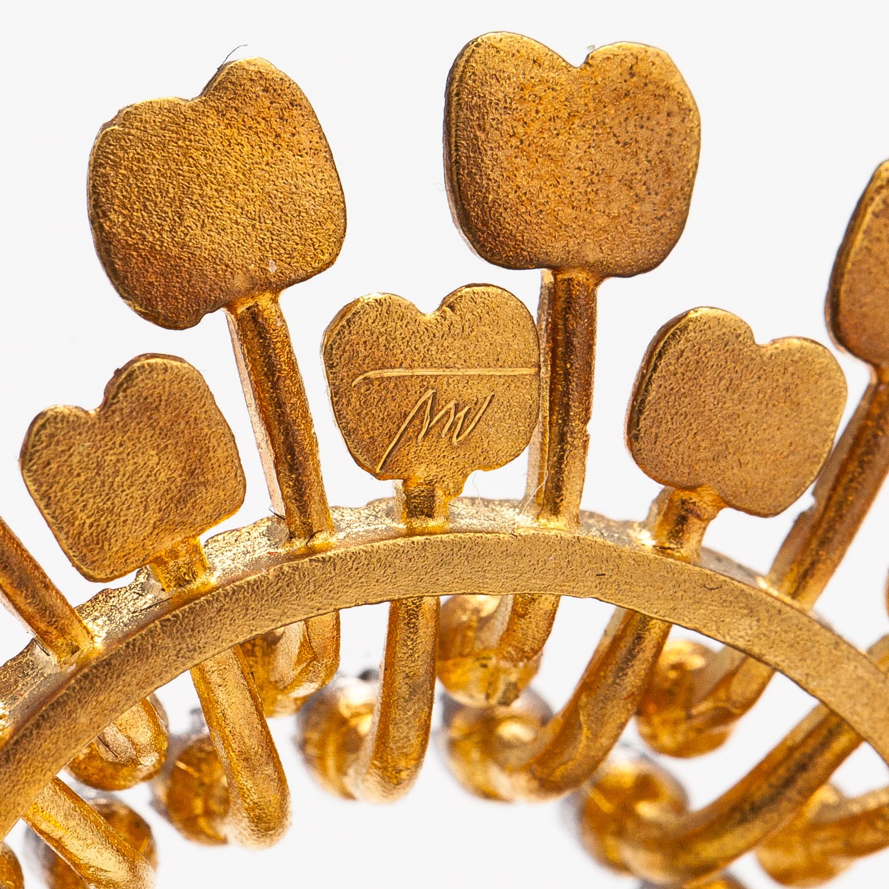 Tapio Wirkkala,  "Sun", an 18K gold brooch with diamonds ca 0.13 ct in total. Kultakeskus, Hämeenlinna 2000.