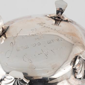 A silver coffee pot with creamer and sugarbox. CG Hallberg, Stockholm 1946.