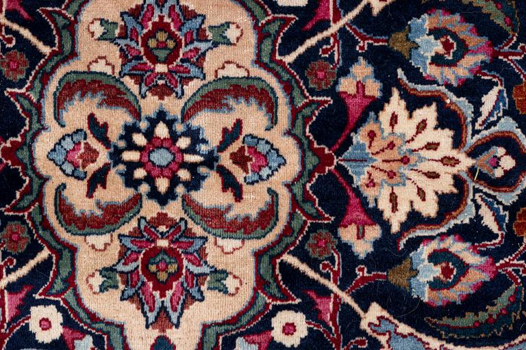 A oriental carpet, c. 375 x 290 cm.