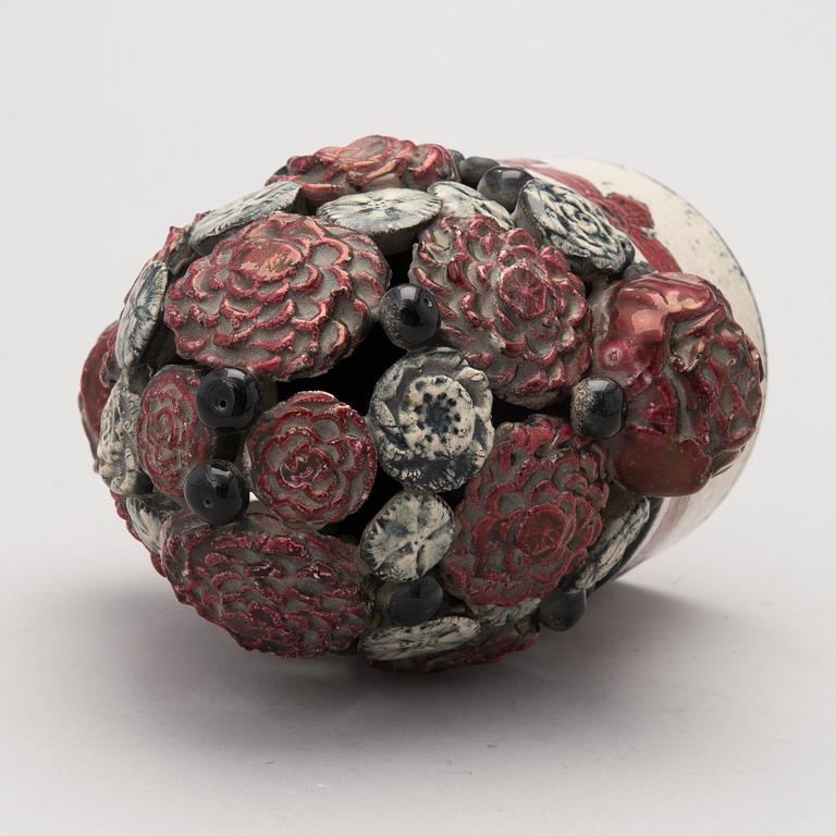 A stoneware sculpture, signed Kaipiainen Arabia.