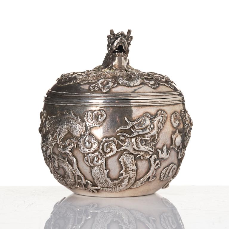 A Chinese Silver Dragon Bowl, mark of Wang Hing & Co, active c 1854-1925.