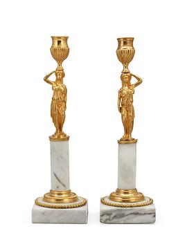 672. A pair of late Gustavian circa 1800 candlesticks.