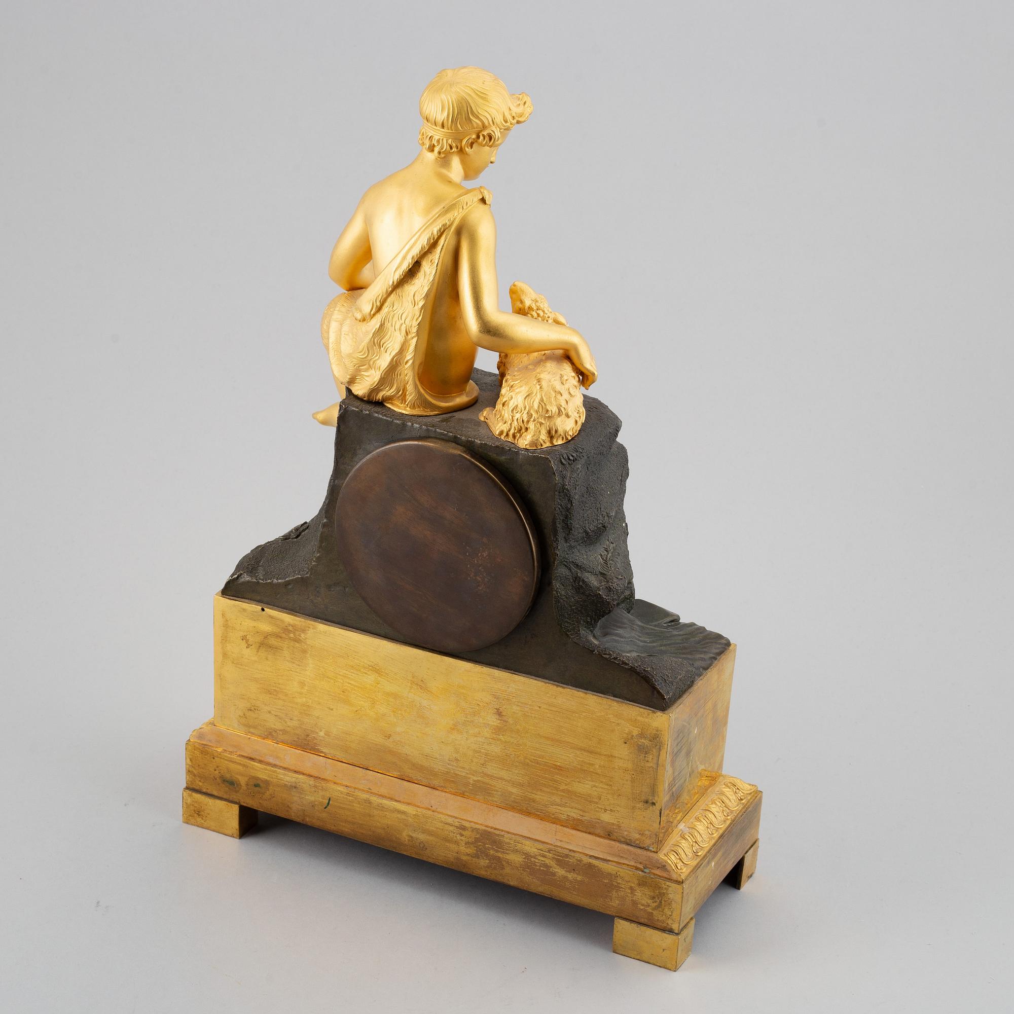 An empire mantel clock, first half of the 19th century.