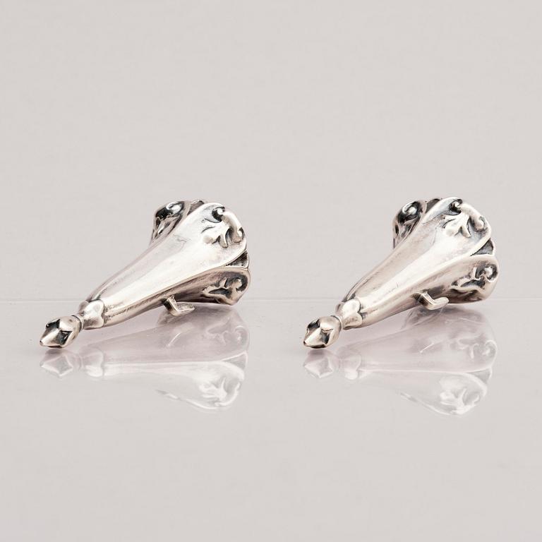 Gustaf Möllenborg, nattljusstakar, ett par, silver, Stockholm 1857.