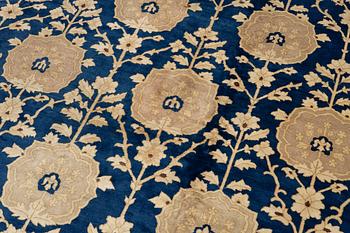 An antique Peking carpet, north China, c. 438 x 373 cm.