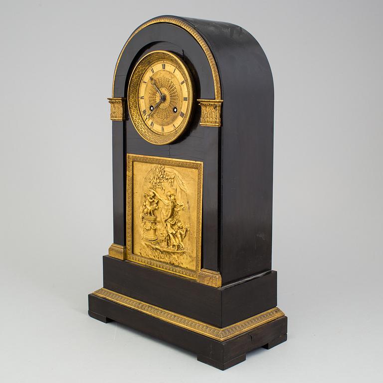 An enpire mantle clock, first half oc the 19th Century.