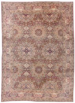 399. An antique Kerman Laver carpet, south east persia, ca 501 x 359 cm.