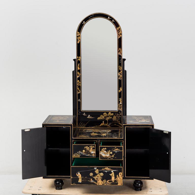 A Chinese lacquered dressing table and stool, 20th century.