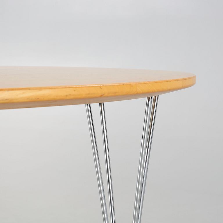 A coffee table named "Supercirkel", designed by Piet Hein and Bruno Mathsson.