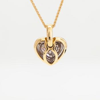 An 18K gold necklace/ heartpendant  set with diamonds totalling approximately 0.05 ct.