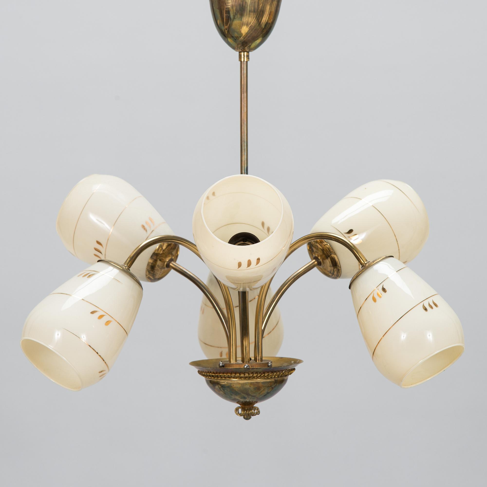 A mid-20th-century brass ceiling light, Finland.