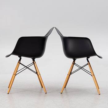 Charles & Ray Eames, a pair of "DAW" plastic chairs, Vitra, Italy, 2015.