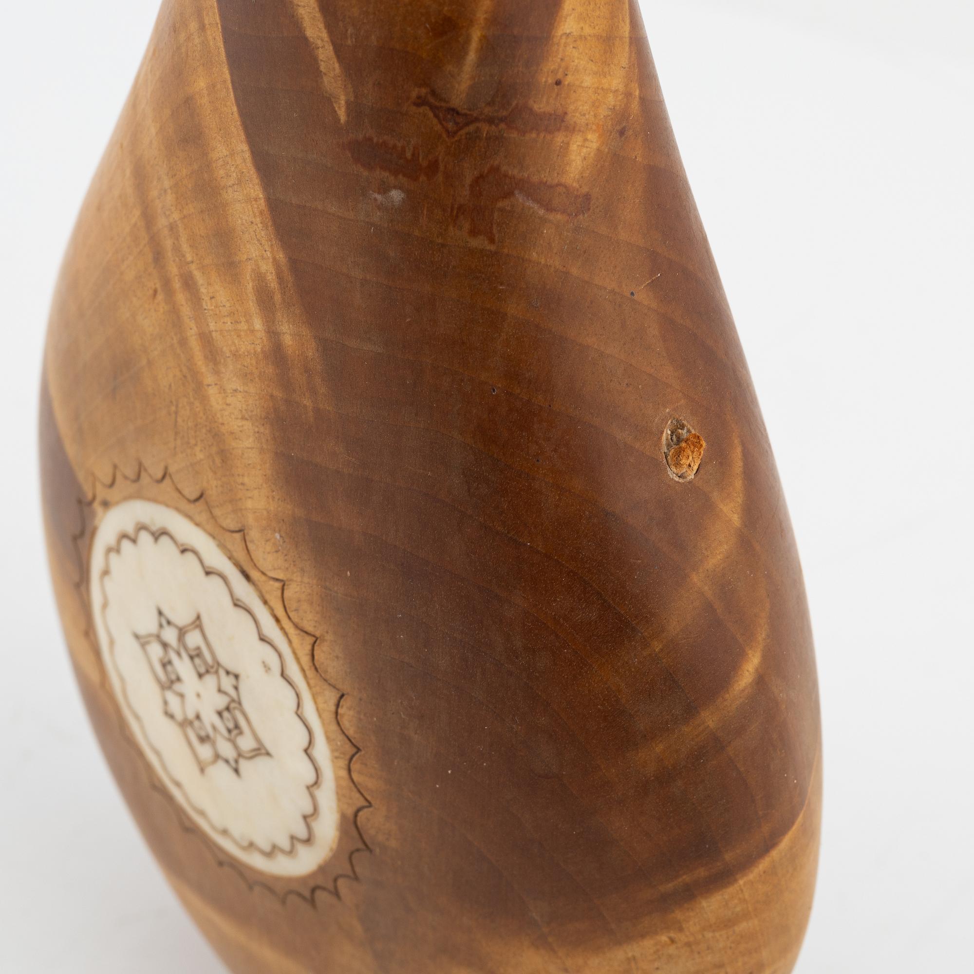 Anders Sunna, a birch and reindeer horn salt bottle, signed AS.