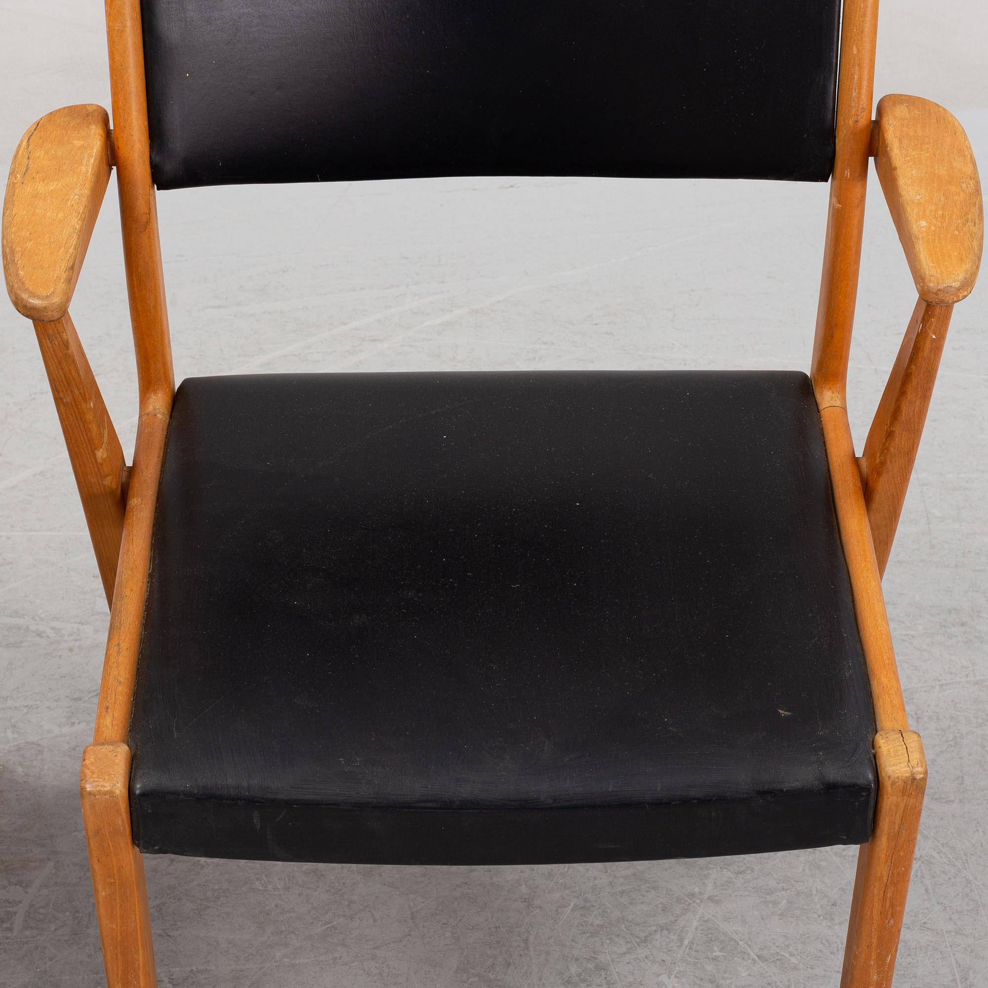 A pair of 1950's/60's armchairs.