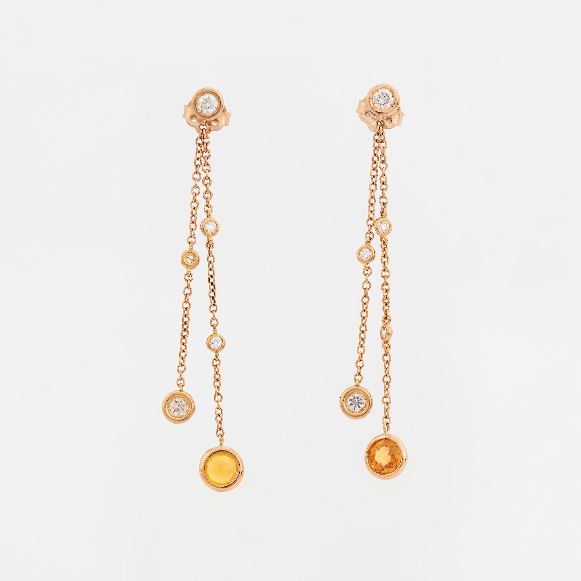 Yellow sapphire and brilliant-cut diamond earrings.
