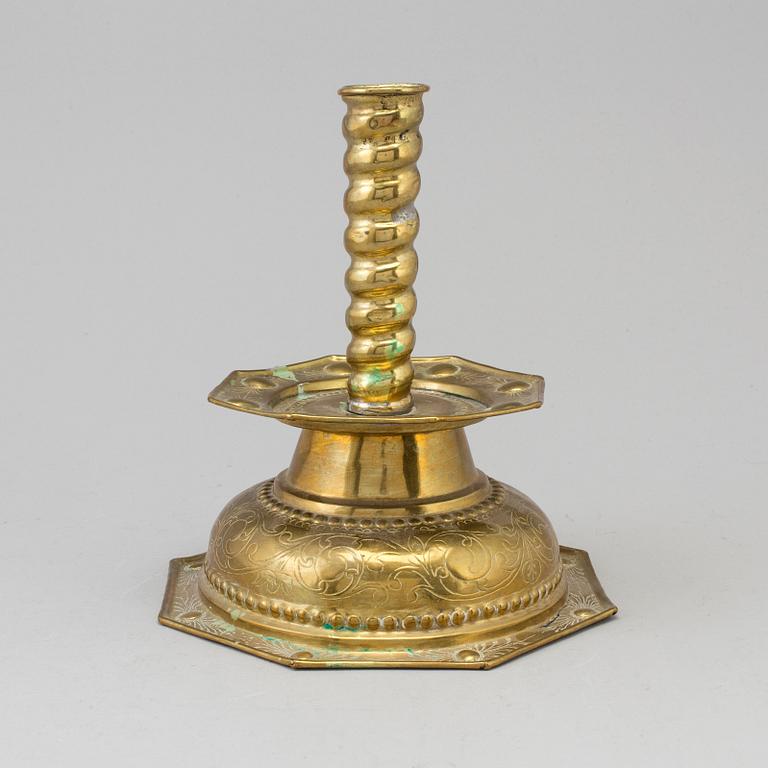 A 18th century Baroque brass candlestick.