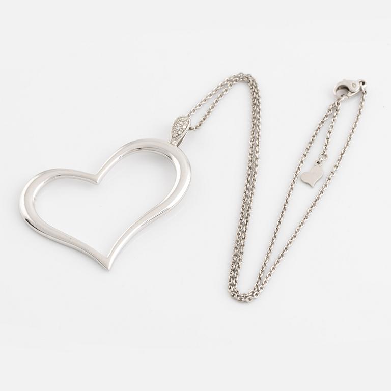 Piaget, 18K white gold and brilliant cut diamond heart necklace.
