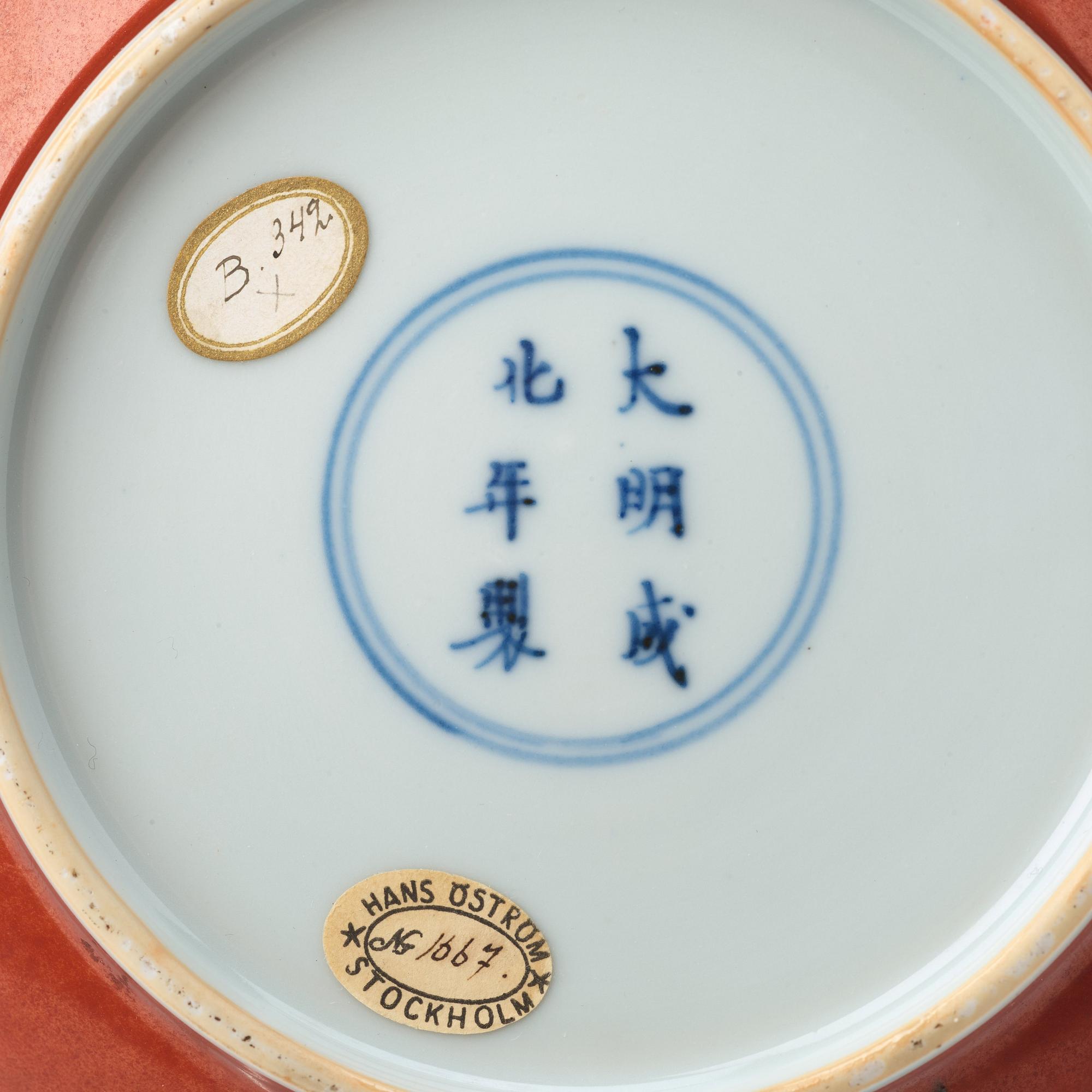 A red glazed dish, 17th Century with Chenghua mark.