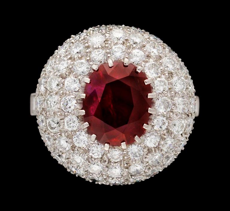 A gold, ruby and diamond ring.