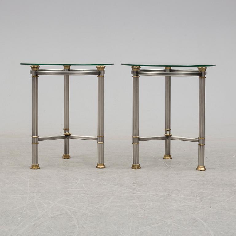 A pair of steel and brass side tables, late 20th Cenury.