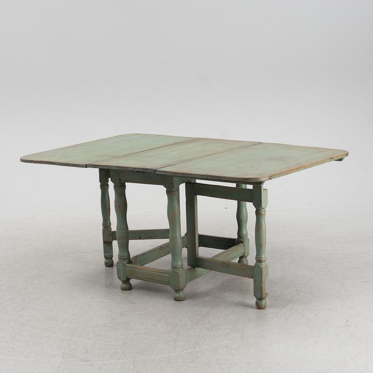 A painted pine gate-leg table, 19th Century.