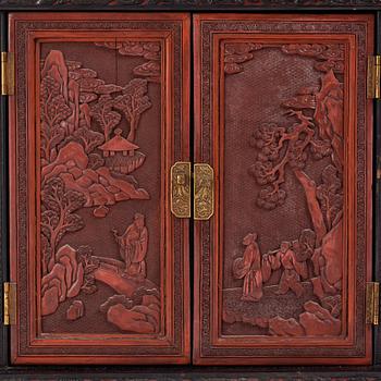 A lacquer display cabinet, late 19th Century.