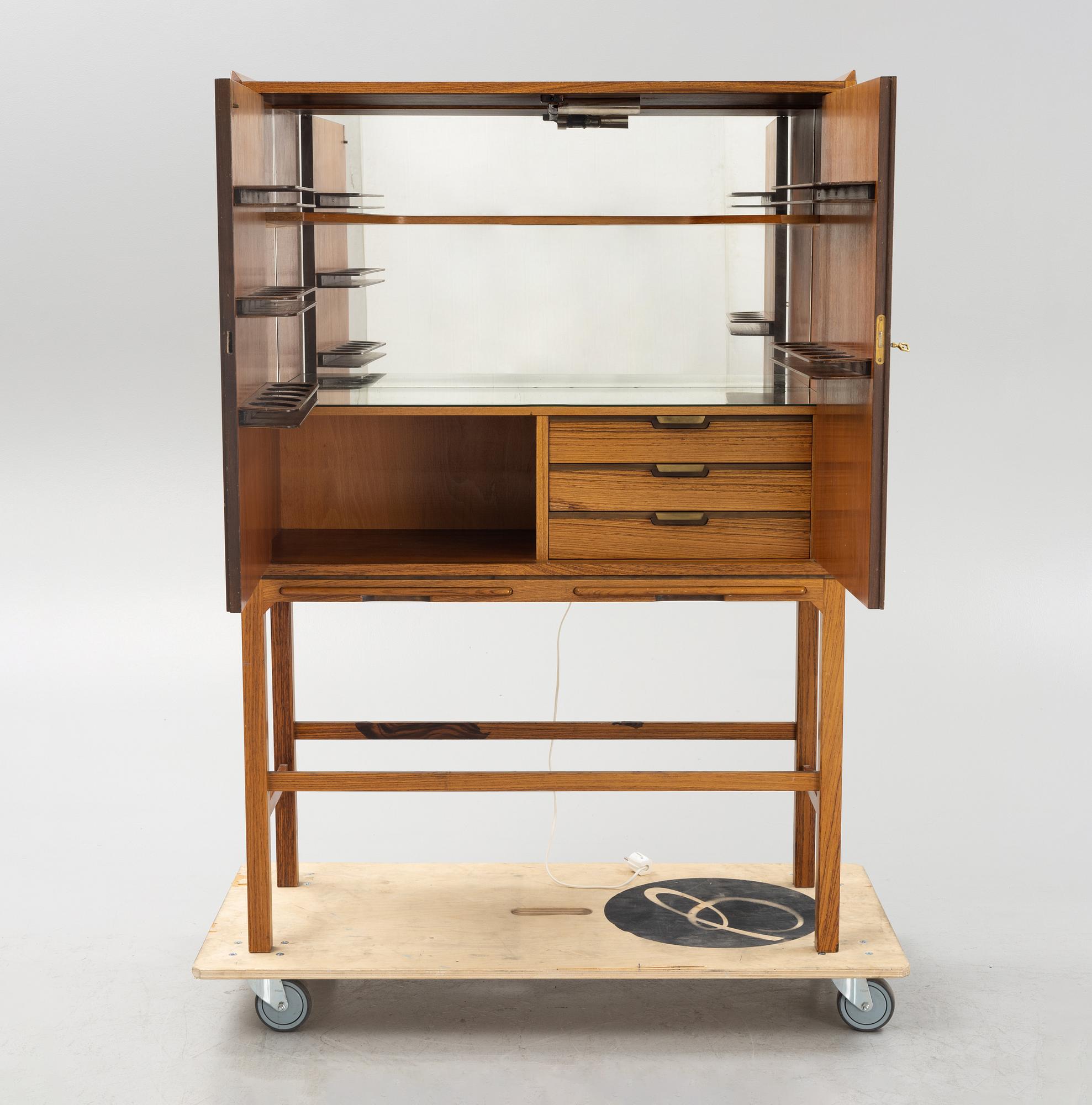 A mid 20th century bar cabinet.
