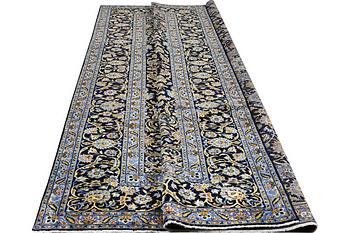 A carpet, Kashan, c. 393 x 297 cm.