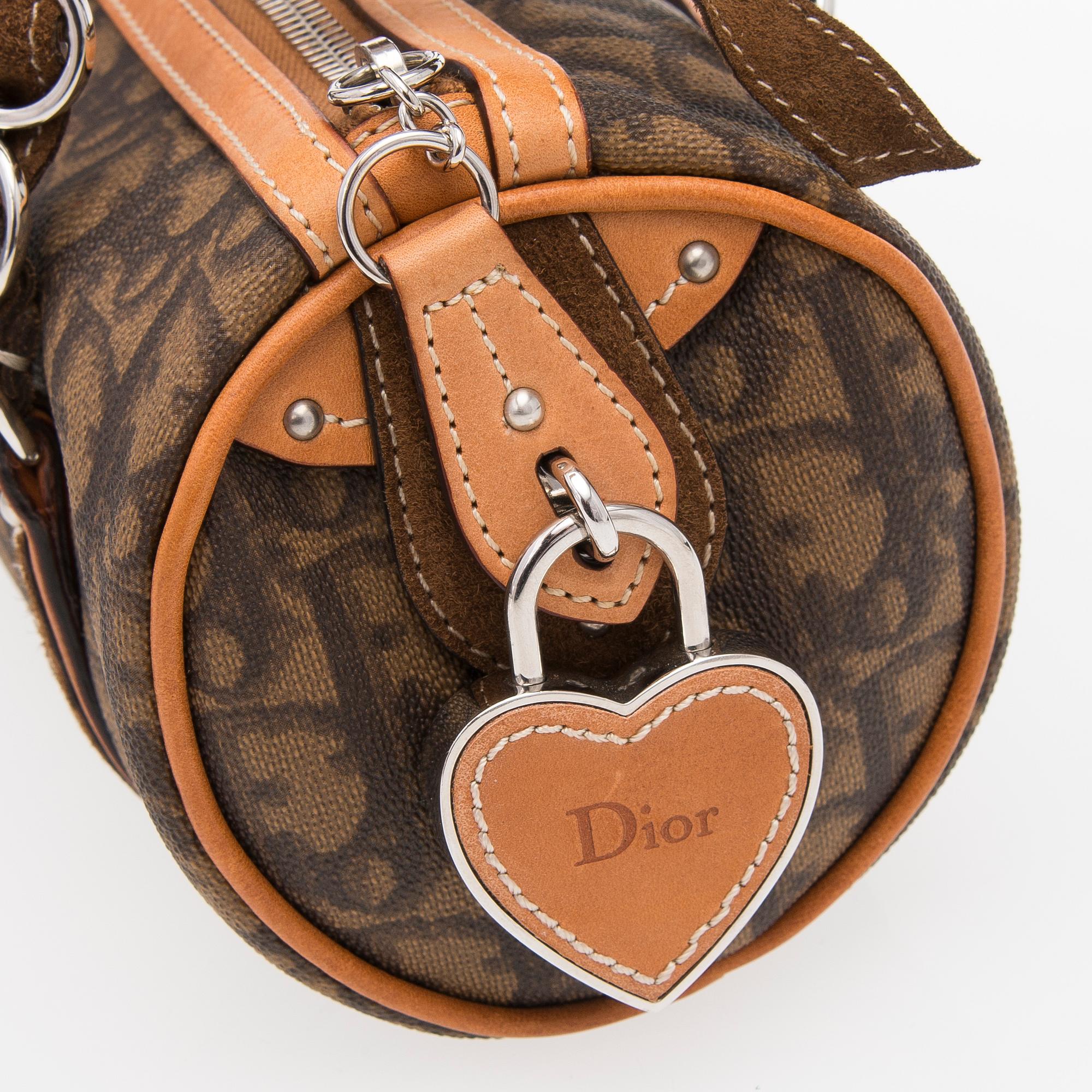 A Monogram Trotter Romantique Round Handbag.
