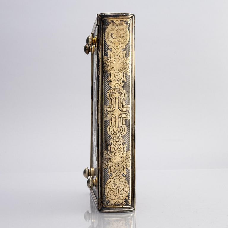 A Russian parcel-gilt silver book cover, mark of Sergei Vyerkovthyev, St. Petersburg 1873-1874.