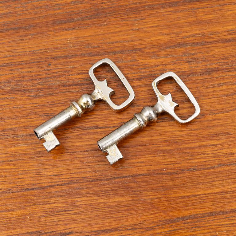 A mid20th century teak-veneered sideboard.