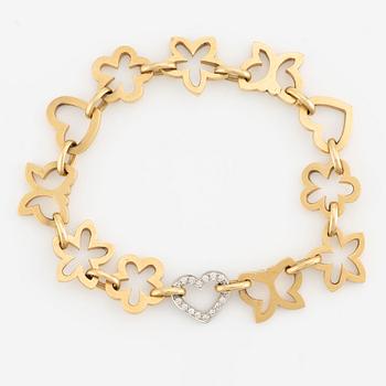 Ole Lynggaard bracelet in 18K gold with round brilliant-cut diamonds.